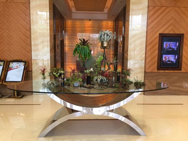 Imagen de los interiores del Hotel The Sandalwood, Beijing - Marriott Executive Apartments. Foto 19