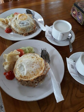 Imagen del bar/restaurante del Hotel The Sandat Bungalow. Foto 20