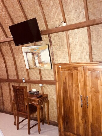 Imagen general del Hotel The Sandat Bungalow. Foto 17