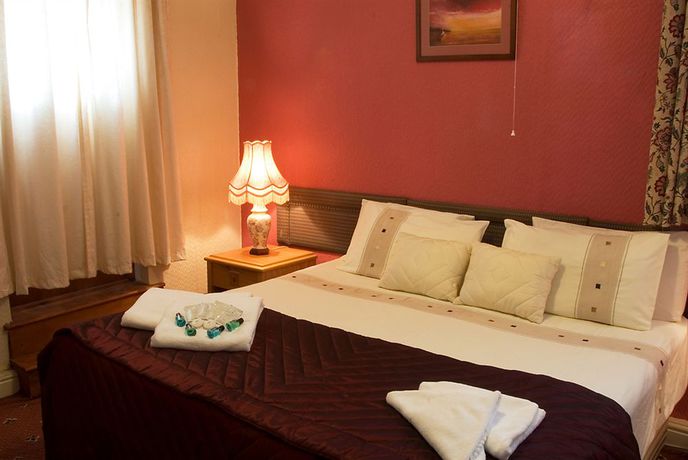 Imagen de la habitación del Hotel The Sanderling. Foto 10