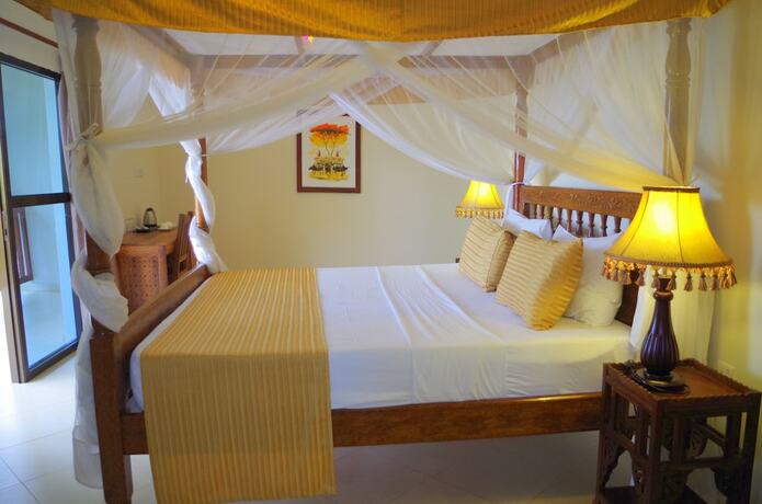 Imagen de la habitación del Hotel The Sands Beach Resort Zanzibar. Foto 15