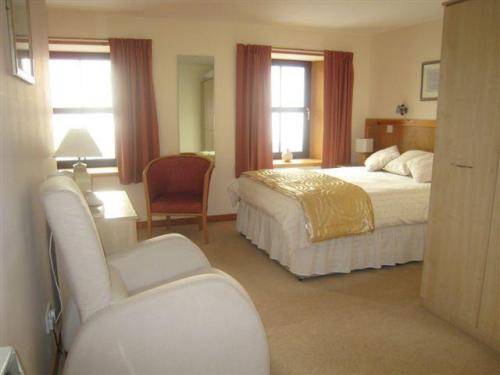 Imagen de la habitación del Hotel The Sands. Foto 3