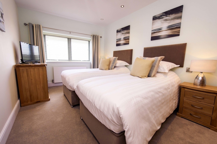 Imagen de la habitación del Hotel The Sands - Sea Front Apartments. Foto 9