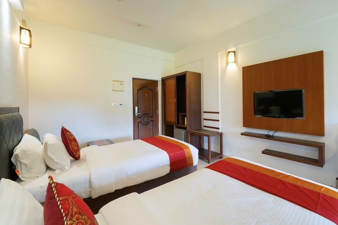 Imagen de la habitación del Hotel The Sanihara. Foto 5