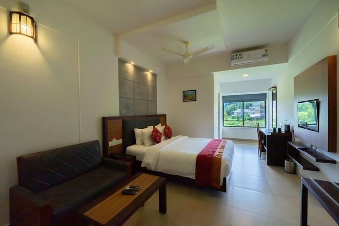 Imagen de la habitación del Hotel The Sanihara. Foto 6