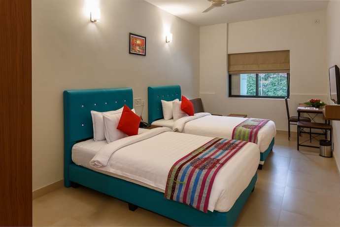 Imagen de la habitación del Hotel The Sanihara. Foto 12