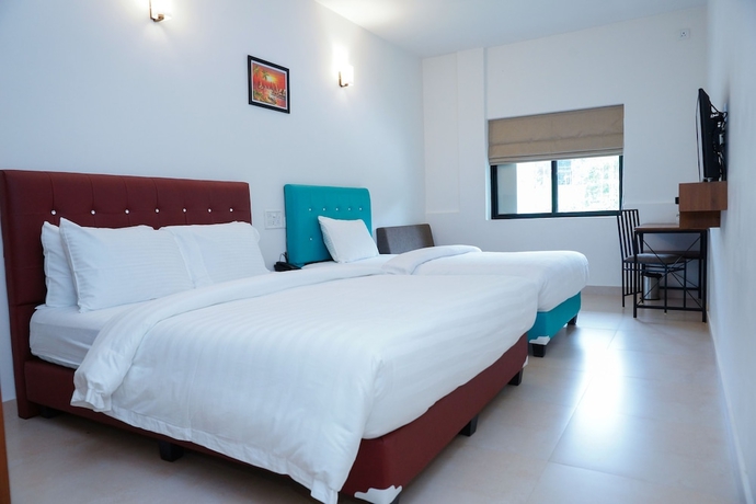 Imagen de la habitación del Hotel The Sanihara. Foto 13