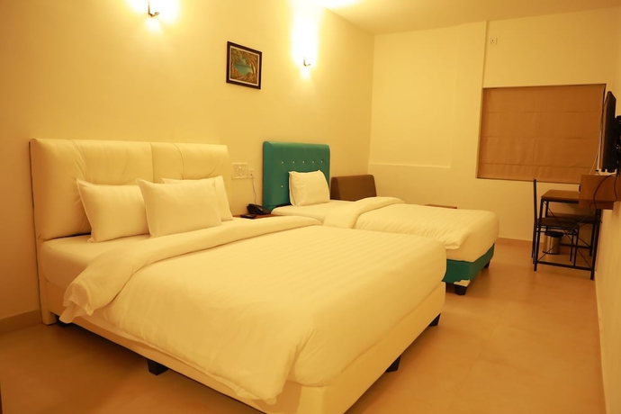 Imagen de la habitación del Hotel The Sanihara. Foto 15