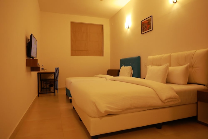 Imagen de la habitación del Hotel The Sanihara. Foto 16