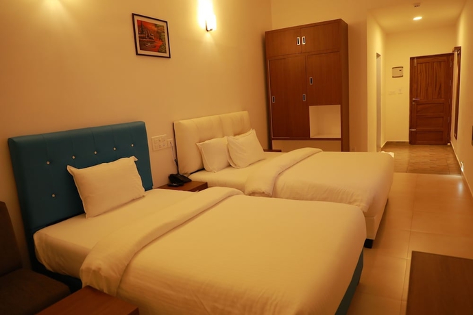 Imagen de la habitación del Hotel The Sanihara. Foto 17