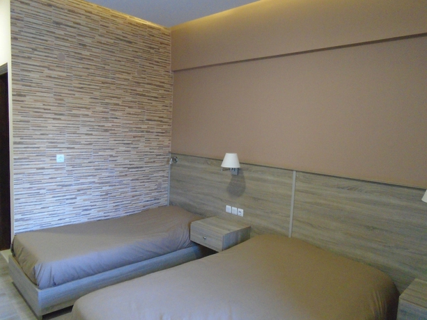 Imagen de la habitación del Hotel The Santo George Beach Resort. Foto 10