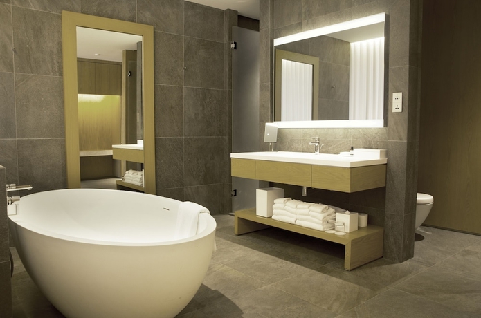 Imagen de la habitación del Hotel The Sanya Edition. Foto 10