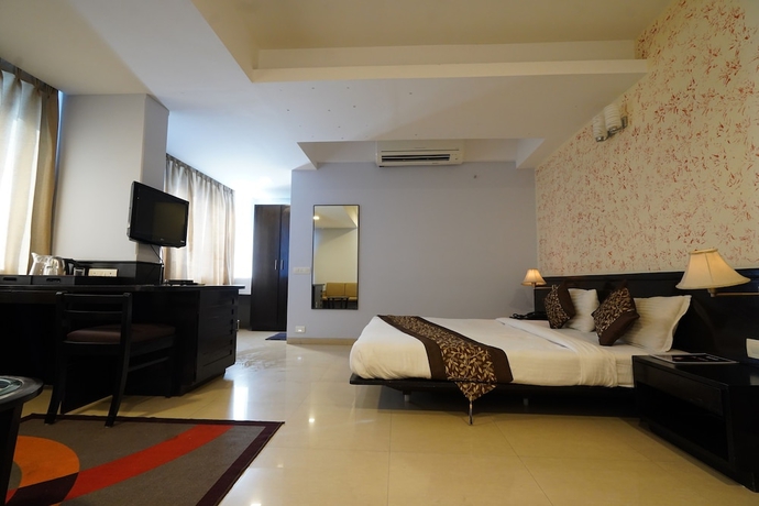 Imagen de la habitación del Hotel The Sapphire Comfort. Foto 1