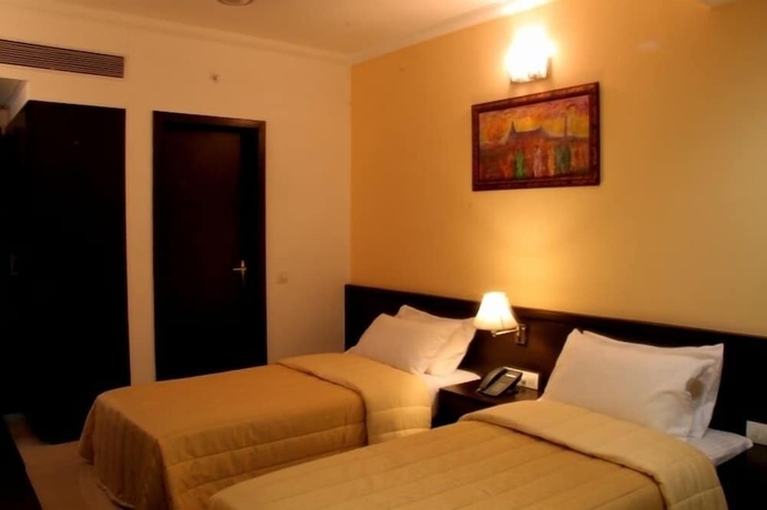 Imagen de la habitación del Hotel The Sapphire Comfort. Foto 5