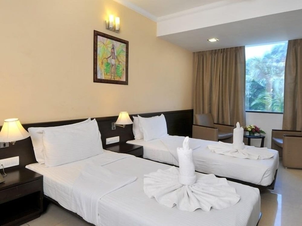 Imagen de la habitación del Hotel The Sapphire Comfort. Foto 6