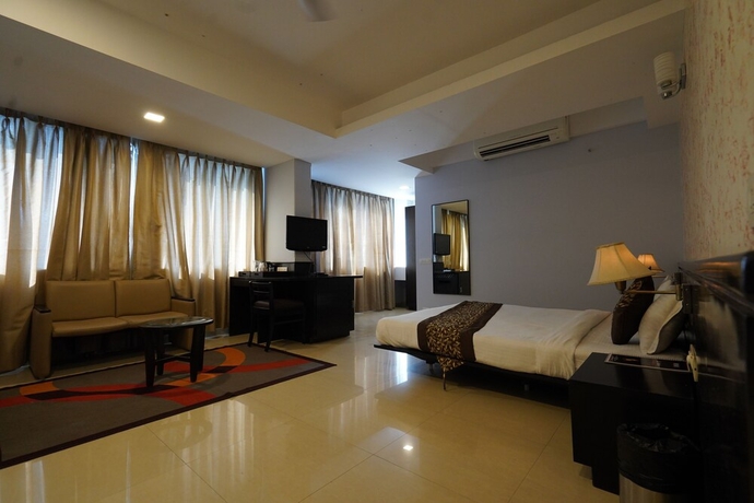 Imagen de la habitación del Hotel The Sapphire Comfort. Foto 11