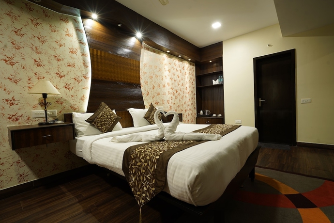 Imagen de la habitación del Hotel The Sapphire Comfort. Foto 12