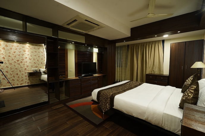 Imagen de la habitación del Hotel The Sapphire Comfort. Foto 16