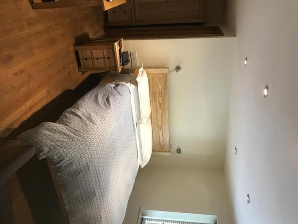 Imagen de la habitación del Hotel The Saracens Head Inn. Foto 16