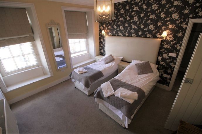 Imagen de la habitación del Hotel The Saracens Head, Swindon. Foto 7