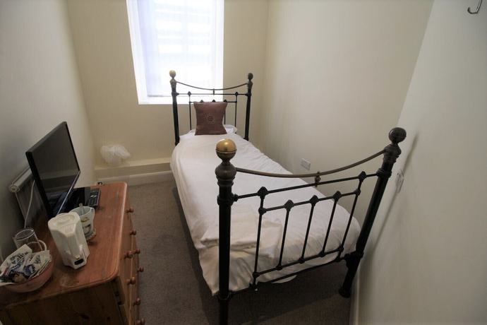 Imagen de la habitación del Hotel The Saracens Head, Swindon. Foto 10