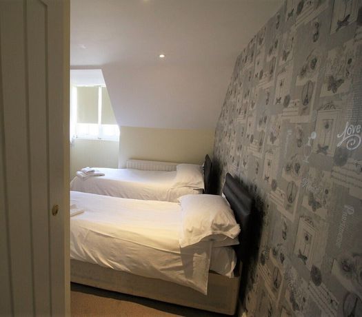 Imagen de la habitación del Hotel The Saracens Head, Swindon. Foto 12