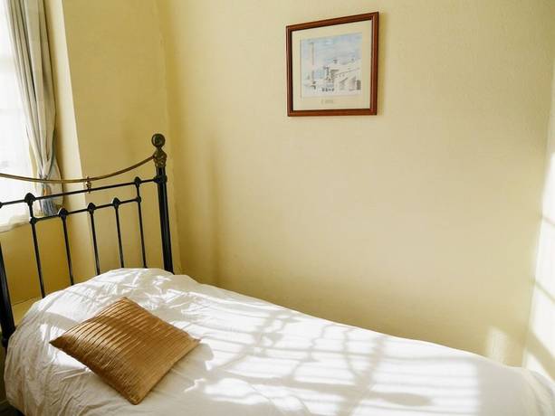 Imagen de la habitación del Hotel The Saracens Head, Swindon. Foto 15