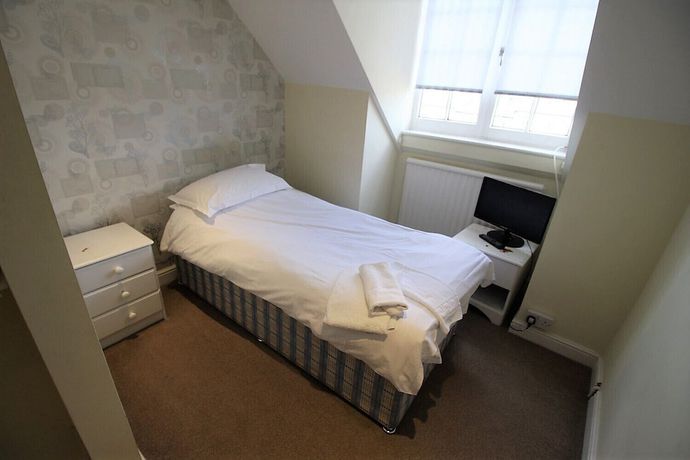 Imagen de la habitación del Hotel The Saracens Head, Swindon. Foto 18