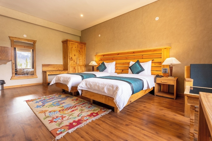 Imagen de la habitación del Hotel The Saraha. Foto 5