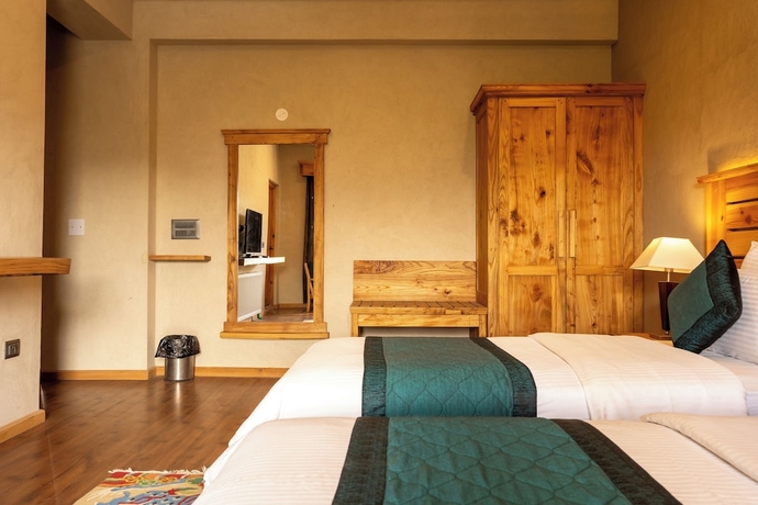 Imagen de la habitación del Hotel The Saraha. Foto 6