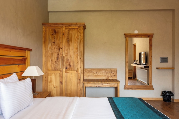 Imagen de la habitación del Hotel The Saraha. Foto 12