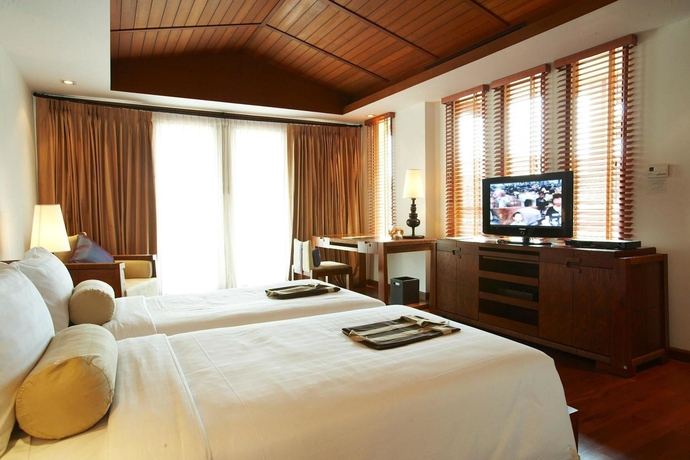 Imagen de la habitación del Hotel The Sarann. Foto 7