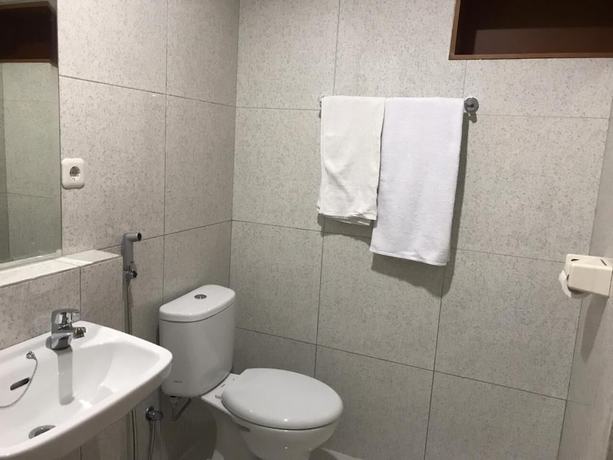 Imagen de la habitación del Hotel The Sarining. Foto 12