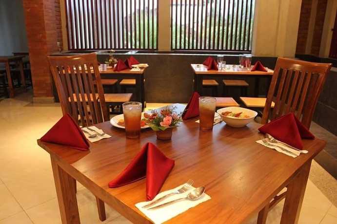 Imagen del bar/restaurante del Hotel The Sarining. Foto 4