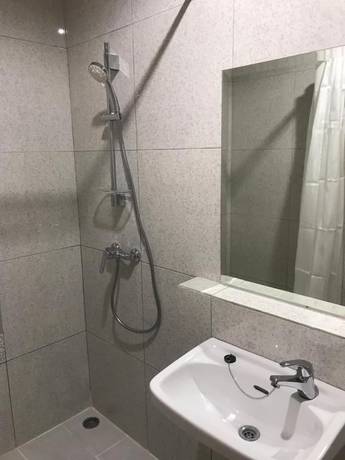 Imagen de la habitación del Hotel The Sarining. Foto 17