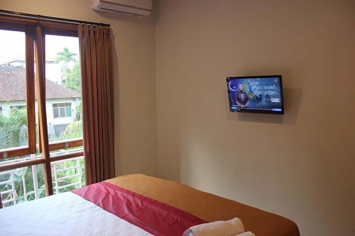 Imagen de la habitación del Hotel The Sarining. Foto 18