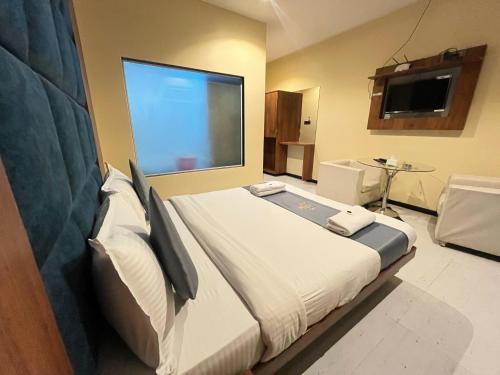 Imagen general del Hotel The Saroja Grand Villa Resorts. Foto 8