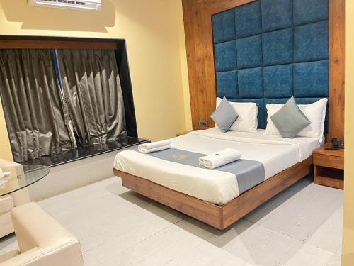 Imagen de la habitación del Hotel The Saroja Grand Villa Resorts. Foto 16