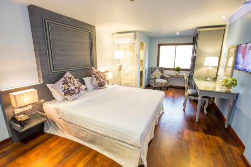 Imagen de la habitación del Hotel The Sathon Vimanda. Foto 2