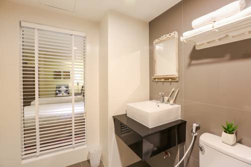 Imagen de la habitación del Hotel The Sathon Vimanda. Foto 3