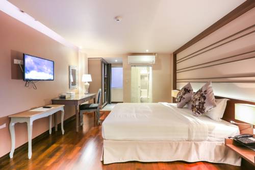 Imagen de la habitación del Hotel The Sathon Vimanda. Foto 6