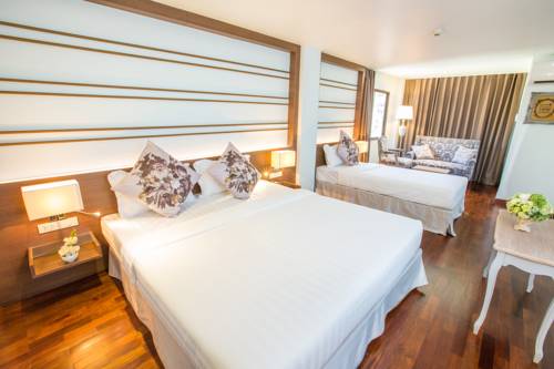 Imagen de la habitación del Hotel The Sathon Vimanda. Foto 9