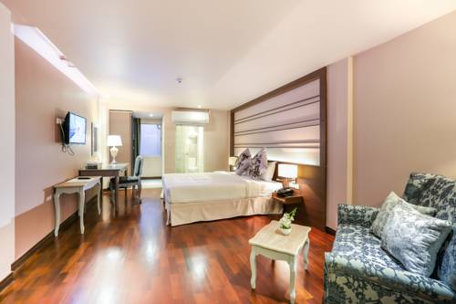 Imagen de la habitación del Hotel The Sathon Vimanda. Foto 10