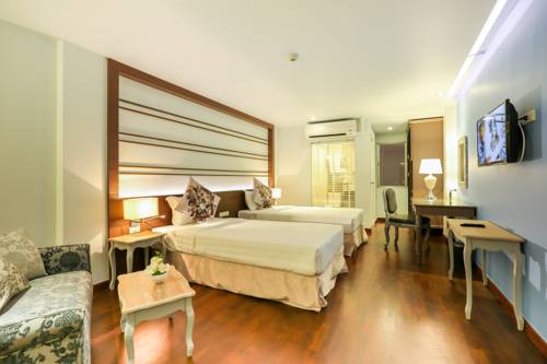 Imagen de la habitación del Hotel The Sathon Vimanda. Foto 16