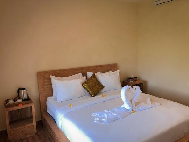 Imagen de la habitación del Hotel The Sawah Resort and Villa. Foto 20