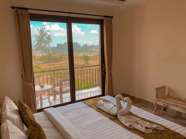 Imagen de la habitación del Hotel The Sawah Resort and Villa. Foto 23
