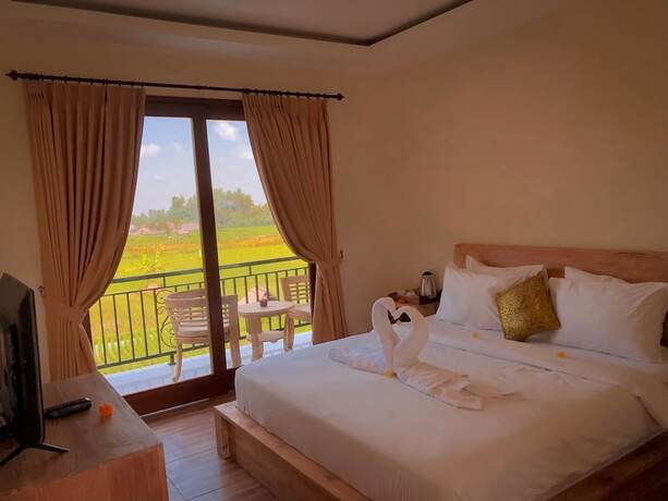 Imagen de la habitación del Hotel The Sawah Resort and Villa. Foto 25