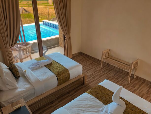 Imagen de la habitación del Hotel The Sawah Resort and Villa. Foto 26