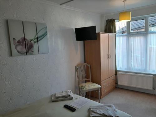 Imagen de la habitación del Hotel The Saxby. Foto 6
