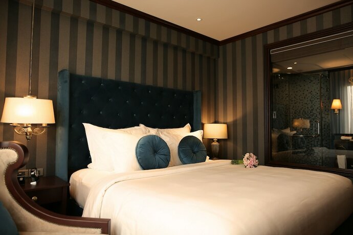 Imagen de la habitación del Hotel The Scarlett Boutique. Foto 16